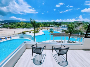 Condo with ocean, mountain and pool views